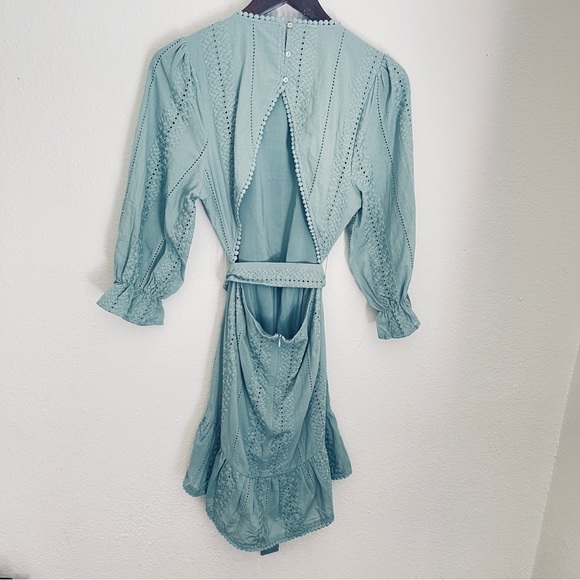 Eyelet Backless Mini Dress w/ round neckline and puff sleeves. Teal color - Picture 7 of 8